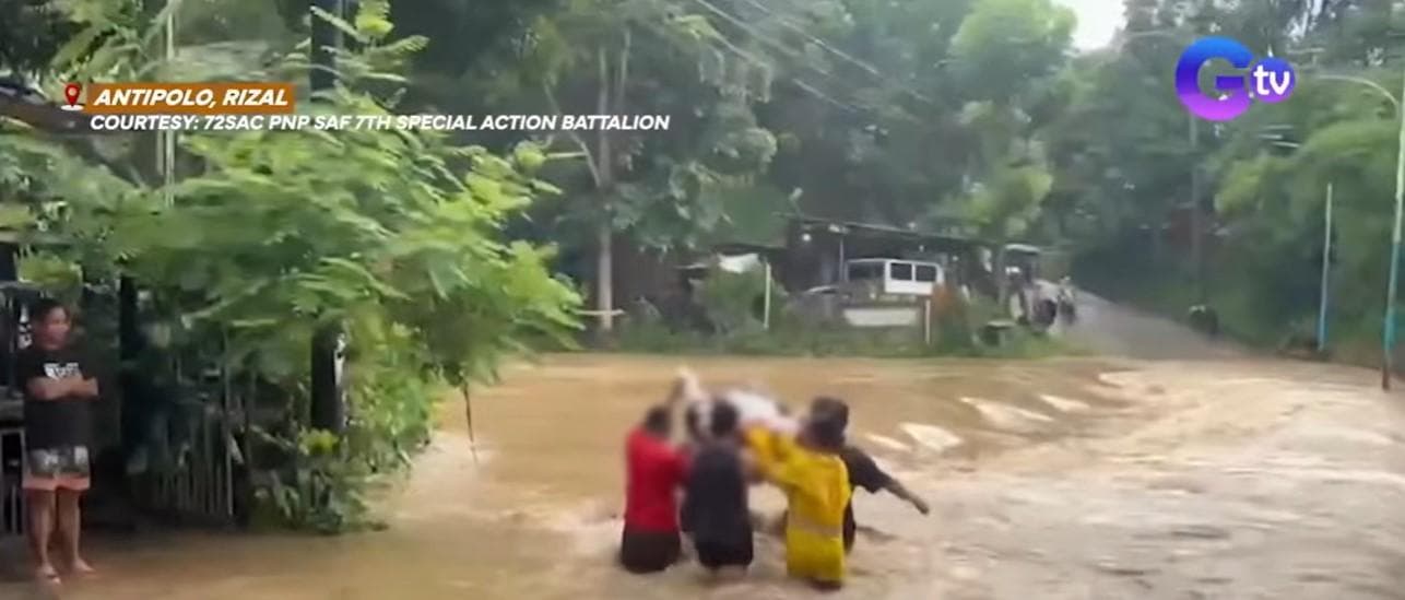 Pulis at mga residente, nagtulungan para itawid ang buntis sa ospital